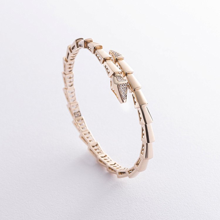 Жесткий браслет "Змея" в желтом золоте (фианиты) б05272 от ювелирного магазина Оникс