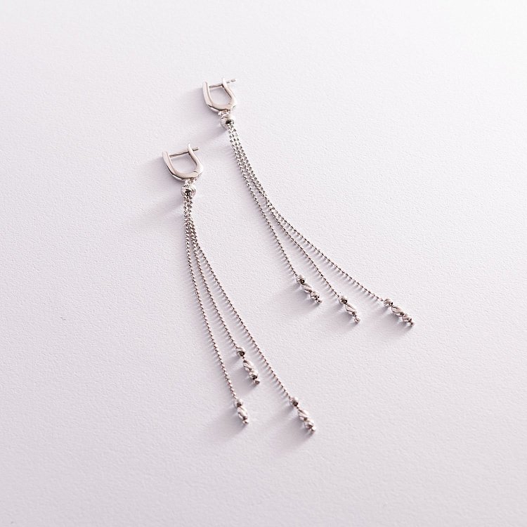 Срібні висячі сережки з кульками 123075 від ювелірного магазину Онікс