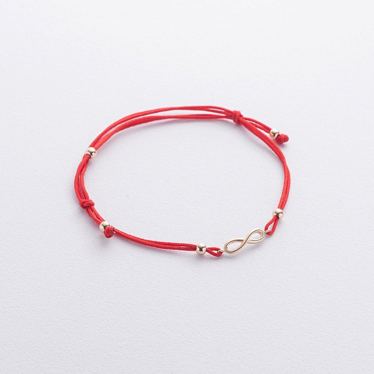 Золотой браслет "Бесконечность" с красной нитью б05522 от ювелирного магазина Оникс