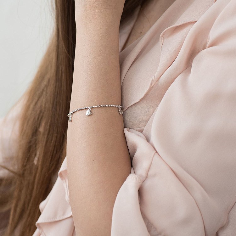 Срібний браслет "Сердечка" (фіаніт) 141430 від ювелірного магазину Онікс - 1