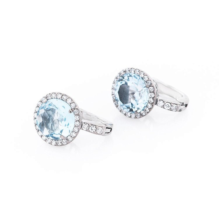 Жіночі сережки з блакитним топазом (фіаніти) 121606 від ювелірного магазину Онікс