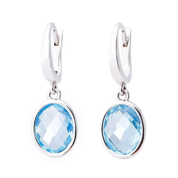 Золоті сережки з блакитним топазом 14048690 від ювелірного магазину Онікс