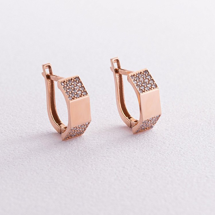 Золоті сережки з фіанітами с05824 від ювелірного магазину Онікс