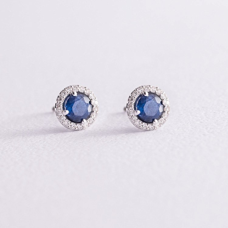 Золоті сережки - пусети "Міра" з сапфірами і діамантами 23157 від ювелірного магазину Онікс