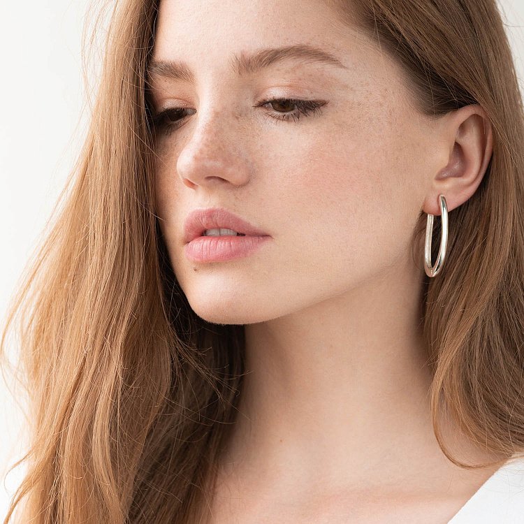 Срібні сережки на англійській застібці 122704 від ювелірного магазину Онікс