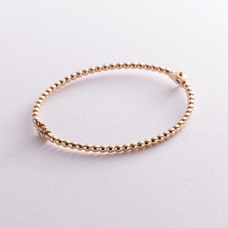 Жесткий золотой браслет "Шарики" б02773 от ювелирного магазина Оникс