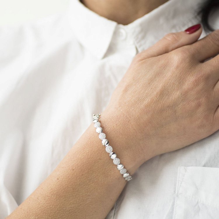 Жорсткий золотий браслет (фіаніти) б03935 від ювелірного магазину Онікс - 2