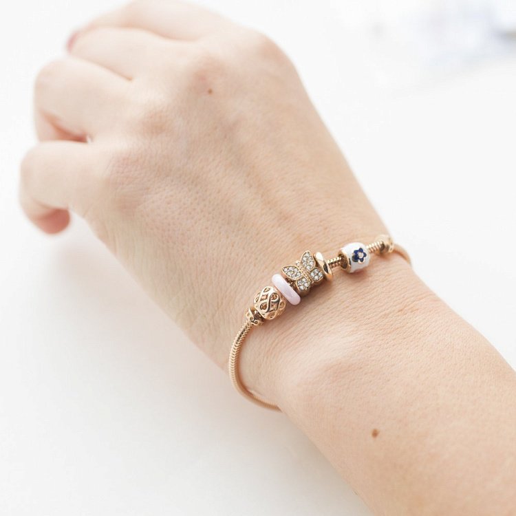 Золотий браслет з підвісками б03120 від ювелірного магазину Онікс - 2