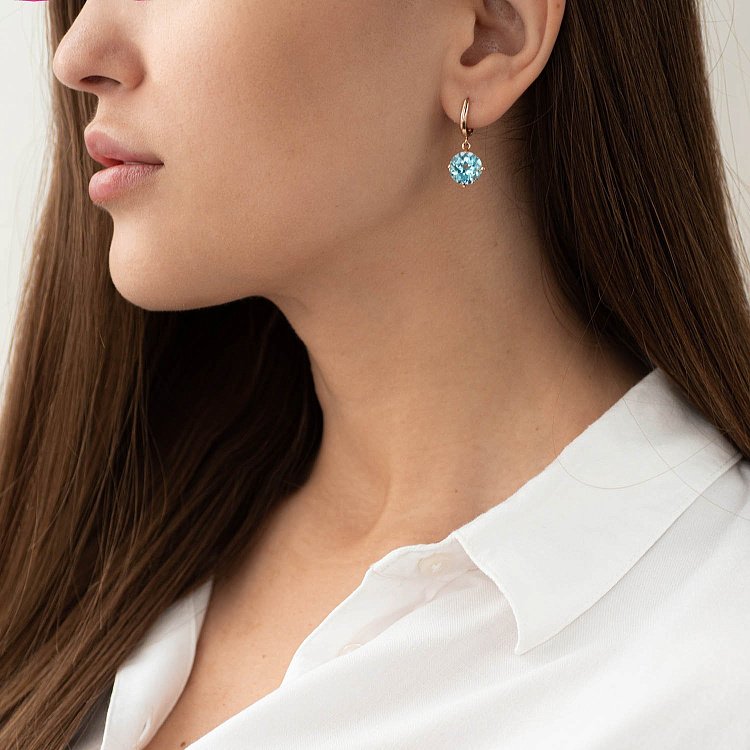 ﻿Золоті сережки "Захоплення" з блакитним топазом с05295 від ювелірного магазину Онікс - 10