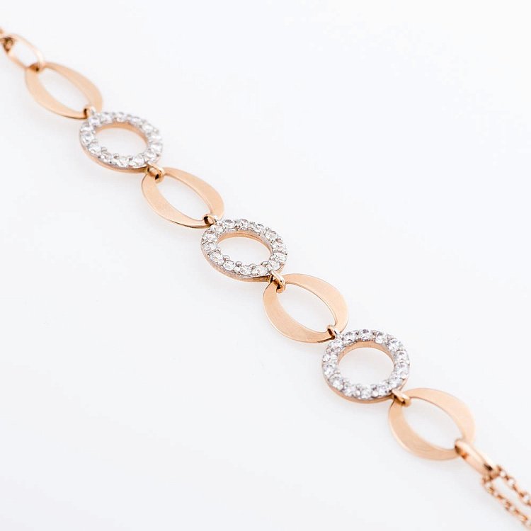 Золотой браслет "Кольца" с фианитами б01018 от ювелирного магазина Оникс - 1