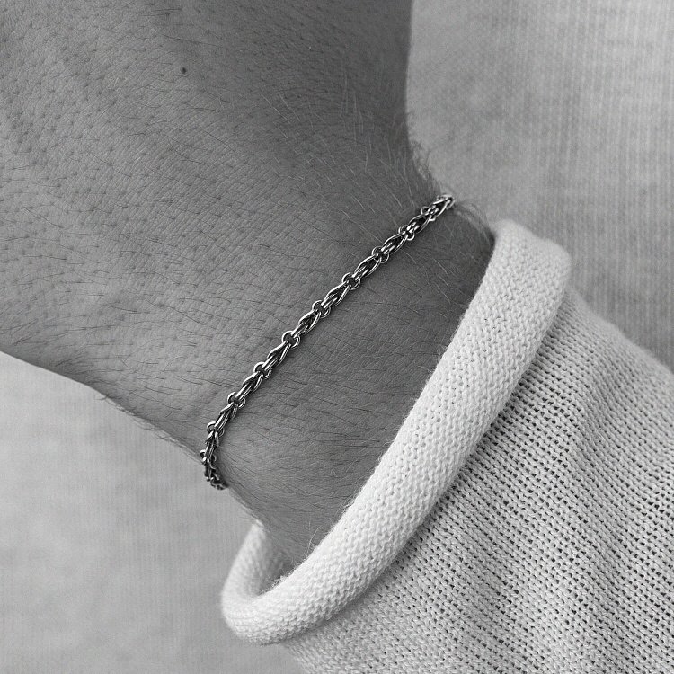 Чоловічий срібний браслет "Нескінченність" 141651 від ювелірного магазину Онікс - 1