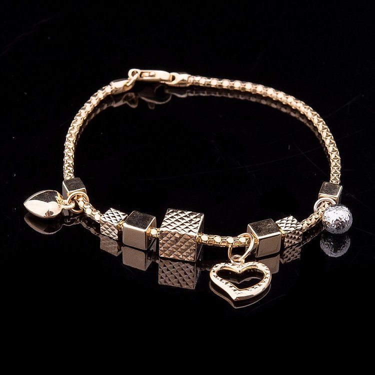 Ексклюзивний золотий браслет з серцями і кулею б02220 від ювелірного магазину Онікс - 1