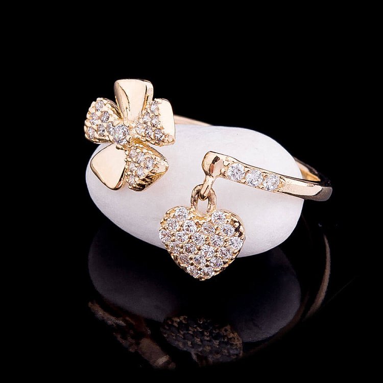 Эксклюзивное золотое кольцо с фианитами к04041 от ювелирного магазина Оникс