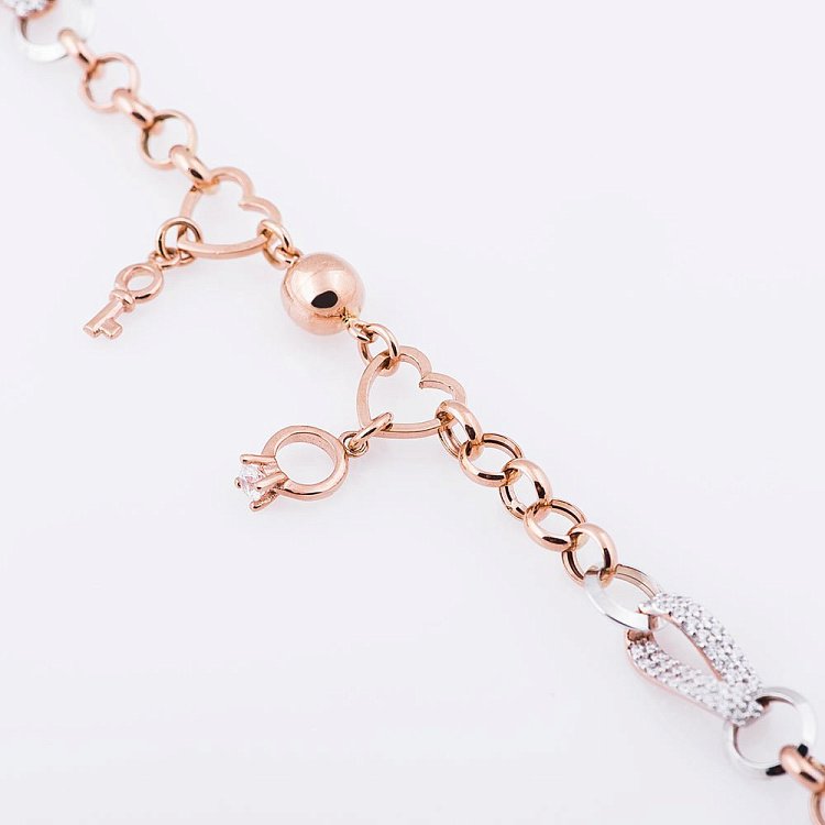 Жіночий золотий браслет з ключиком і колечком (фіаніти) б02799 від ювелірного магазину Онікс - 2