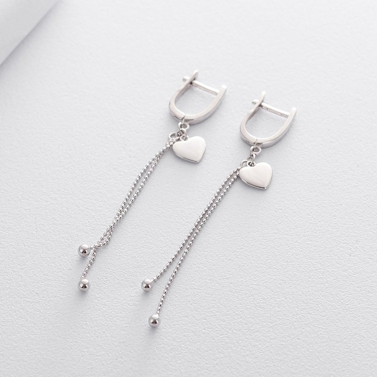 Серебряные серьги с сердечками 122316 от ювелирного магазина Оникс