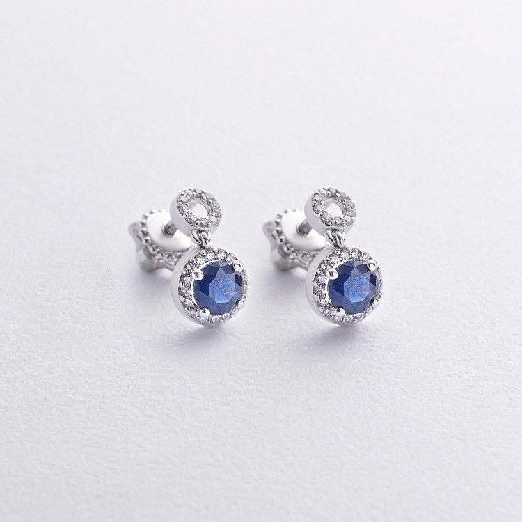 Серебряные серьги - пусеты с синт. сапфирами 2497/1р-NSPH от ювелирного магазина Оникс - 1