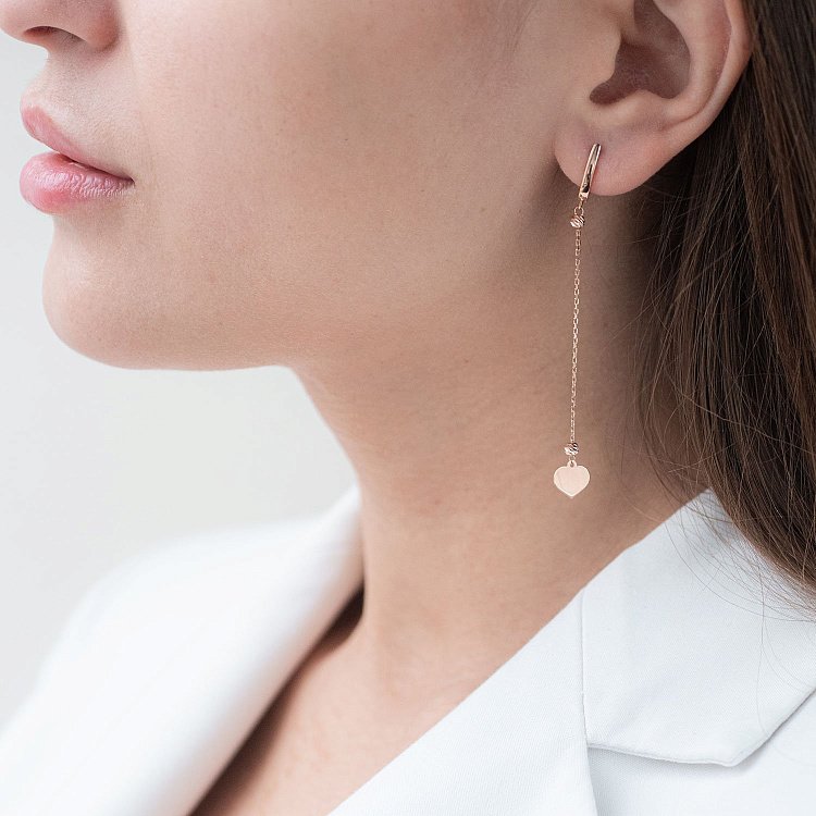 Золоті сережки Сердечки на ланцюжку с07208 від ювелірного магазину Онікс - 1