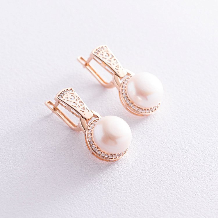 Золоті сережки з перлами і фіанітами с06845 від ювелірного магазину Онікс