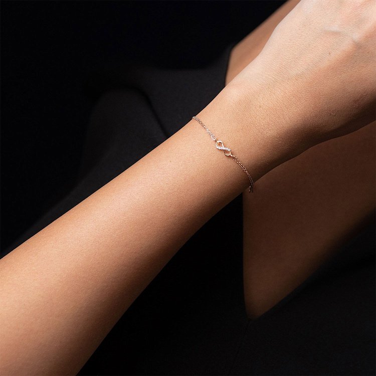 Золотий браслет "Нескінченність" з фіанітами б02945 від ювелірного магазину Онікс - 1