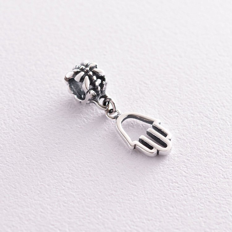 Срібний шарм "Хамса" (чорніння) 132626 Срібний шарм "Хамса" (чорніння) 132626 від ювелірного магазину Онікс