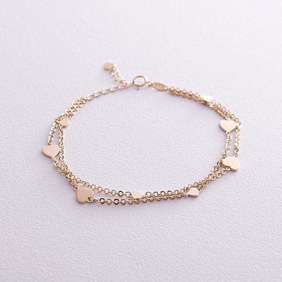 Двойной браслет "Сердечки" в желтом золоте б05196