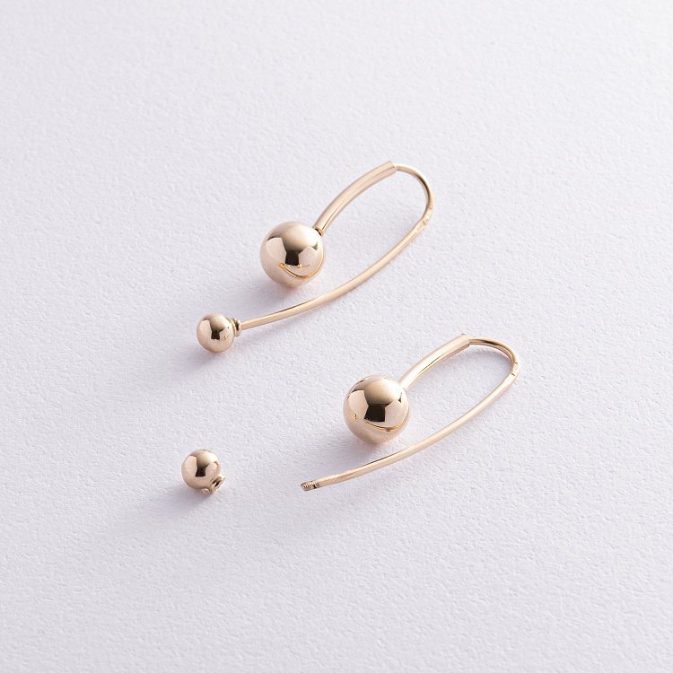 Сережки "Натхнення" з кульками (жовте золото) с08369 від ювелірного магазину Онікс