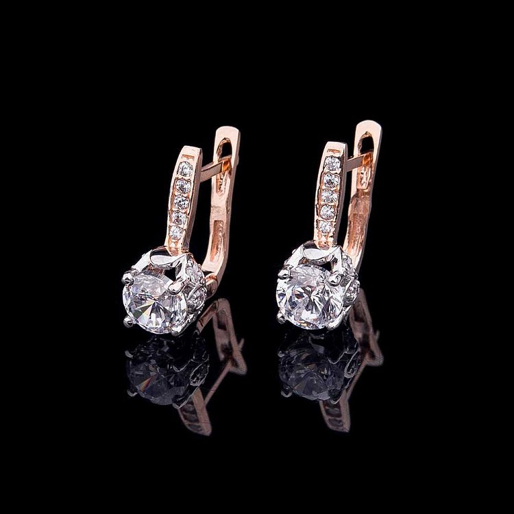 Золоті сережки з фіанітами с04125 від ювелірного магазину Онікс