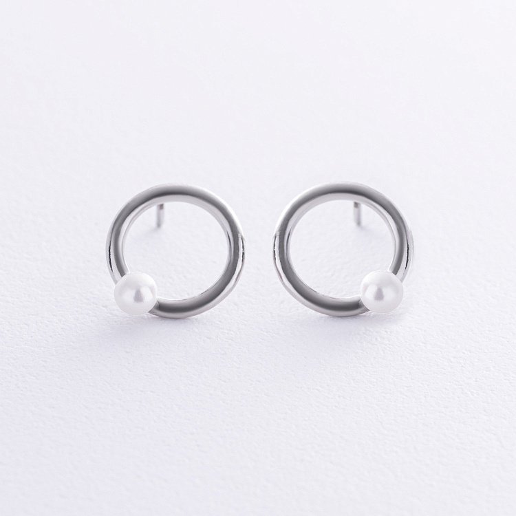 Срібні сережки-пусети "Кругообіг" з перлами 122593 від ювелірного магазину Онікс - 1