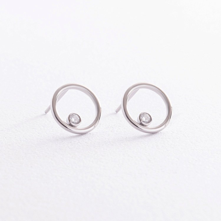 Золотые серьги - пусеты "Круговорот" с фианитами с08353 от ювелирного магазина Оникс