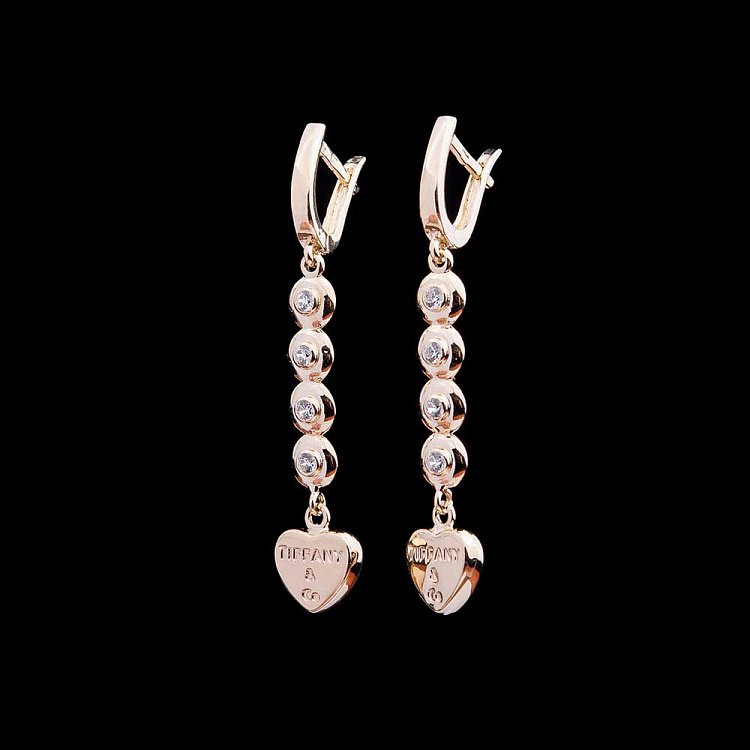 Золотые серьги с сердцами и фианитами с04270 от ювелирного магазина Оникс