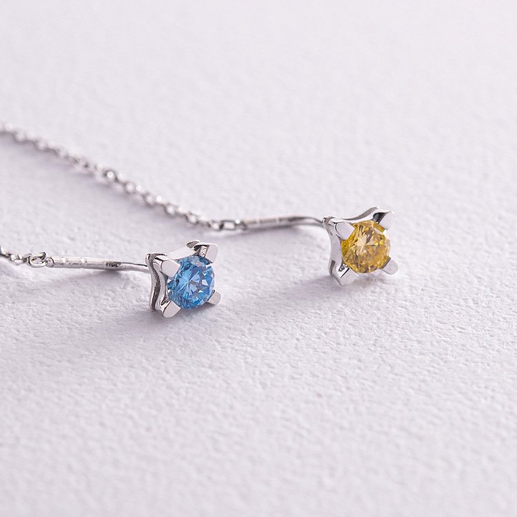 Сережки - протяжки у білому золоті (блакитні та жовті фіаніти) с08122 від ювелірного магазину Онікс - 4