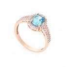 Золотое кольцо с голубым топазом и фианитами к04645 от ювелирного магазина Оникс