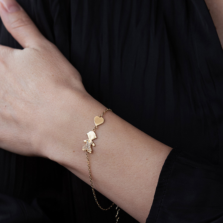 Браслет "Хлопчик і сердечко" у жовтому золоті (фіаніти) б05654 від ювелірного магазину Онікс - 1