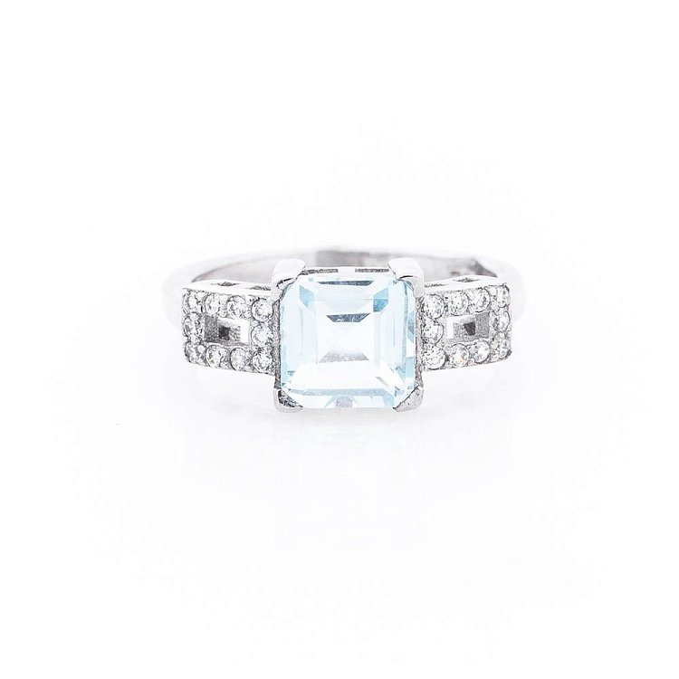Срібний перстень з блакитним топазом і фіанітами 111456 - 2 Срібний перстень з блакитним топазом і фіанітами 111456 від ювелірного магазину Онікс - 2