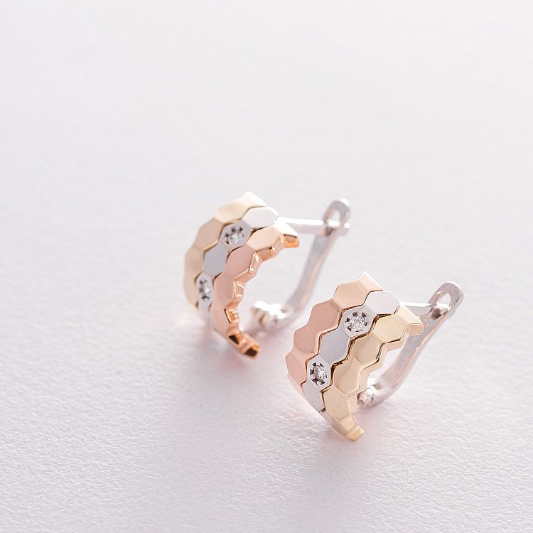 Золоті сережки на англійській застібці з фіанітами с06391 від ювелірного магазину Онікс