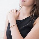 Эксклюзивный золотой браслет с сердцами б02219 от ювелирного магазина Оникс