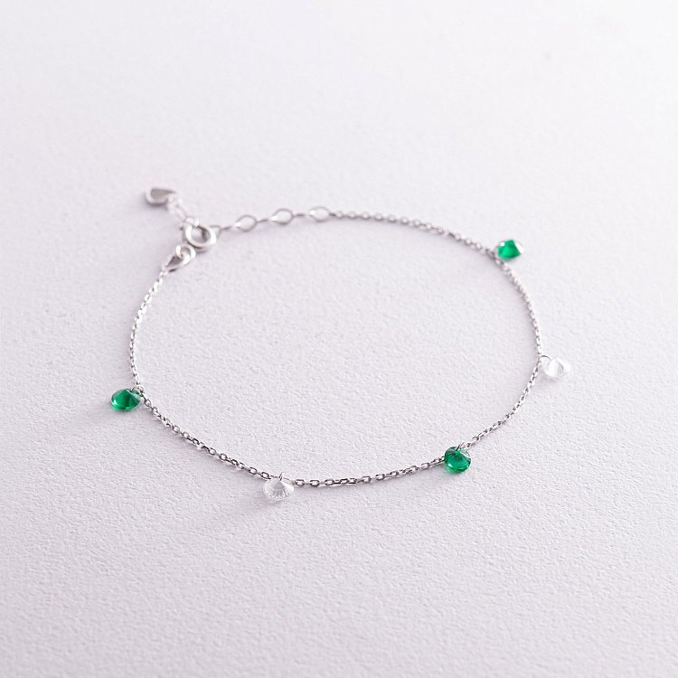 Браслет у білому золоті (зелені та білі фіаніти) б05136 від ювелірного магазину Онікс