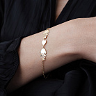 Браслет "Дві дівчинки та сердечко" в жовтому золоті (фіаніти) б05657 от ювелирного магазина Оникс - 1