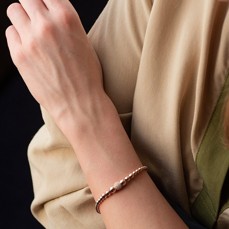 Браслет "Кульки" в червоному золоті (фіаніти) б04697 від ювелірного магазину Онікс - 1