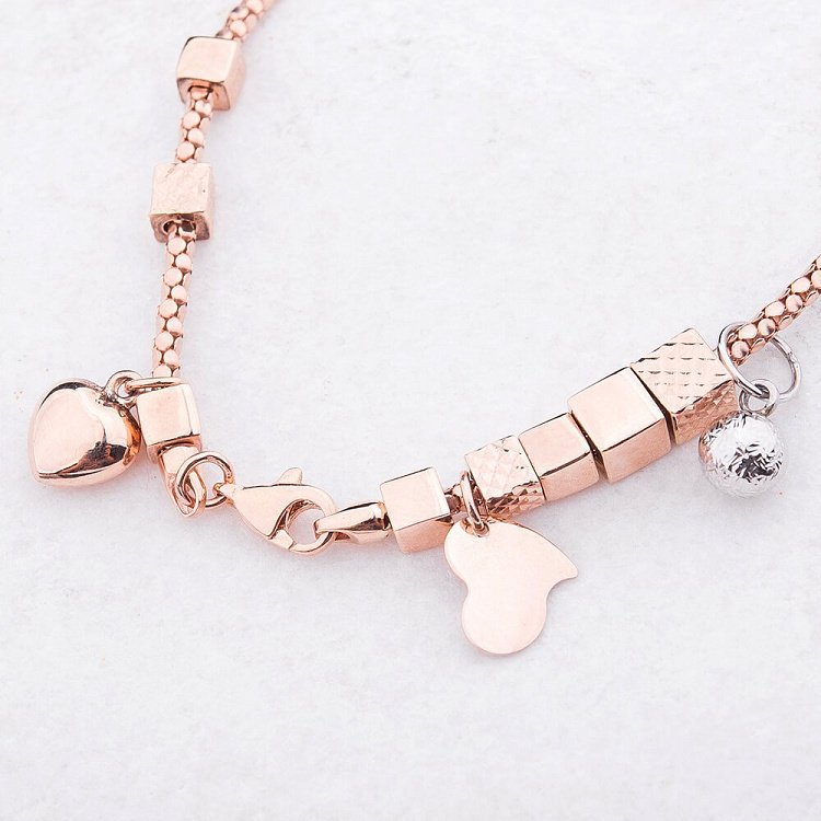 Ексклюзивний золотий браслет з серцями б02219 від ювелірного магазину Онікс - 1