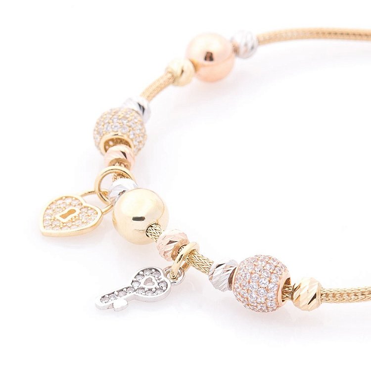 Золотий браслет "Сердечко з ключиком" (фіаніт) б04010 від ювелірного магазину Онікс - 1