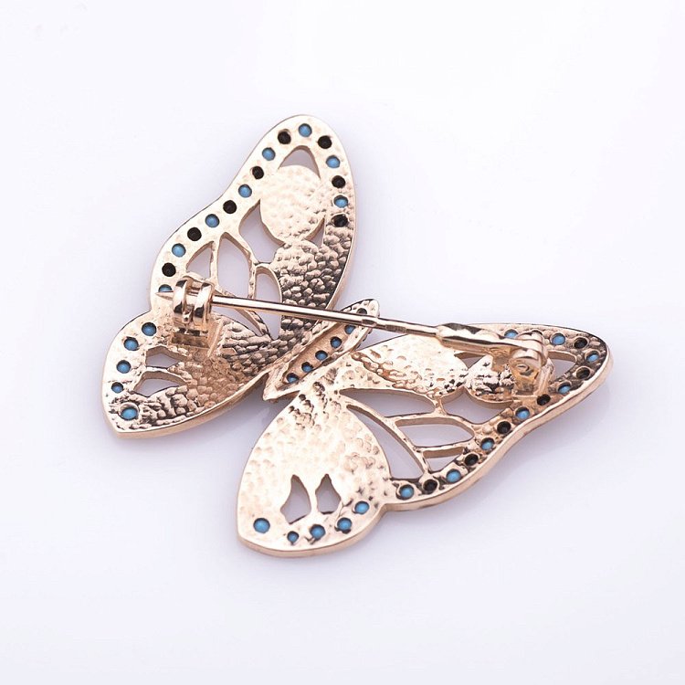 Золота брошка "Метелик" з емаллю 660105E від ювелірного магазину Онікс - 1