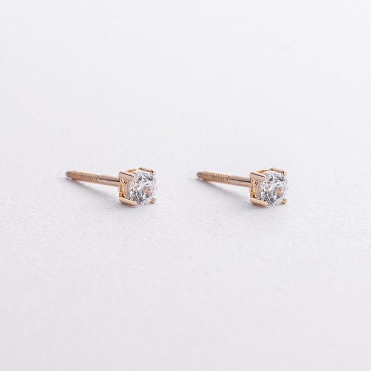 Сережки - пусети з фіанітами (жовте золото) с09641 від ювелірного магазину Онікс