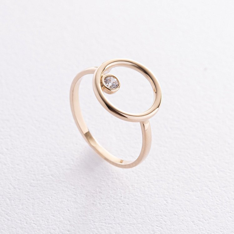 Золотое кольцо "Круговорот" с фианитом к07486 от ювелирного магазина Оникс