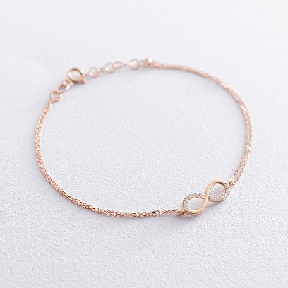 Золотий браслет "Нескінченність" з фіанітами б04544