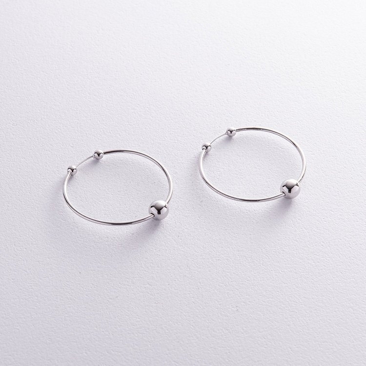 Сережки - кільця Гармонія в білому золоті с08364 від ювелірного магазину Онікс