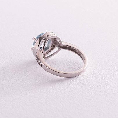 Серебряное кольцо с голубым топазом и фианитами 111430 №3