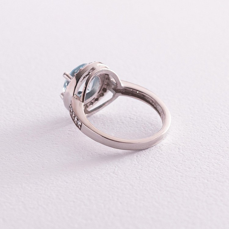 Серебряное кольцо с голубым топазом и фианитами 111430 от ювелирного магазина Оникс - 2