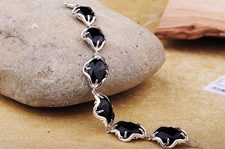 Срібний браслет з обсидіаном 14418 від ювелірного магазину Онікс - 1