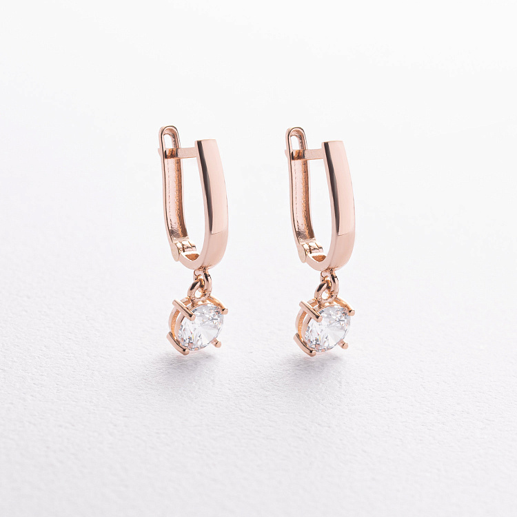 Золотые серьги с фианитами на английской застежке с01444 от ювелирного магазина Оникс